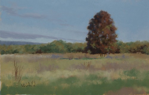 Plein air painting featuring a solitary tree with fall foliage set against the backdrop of the Blue Ridge Mountains