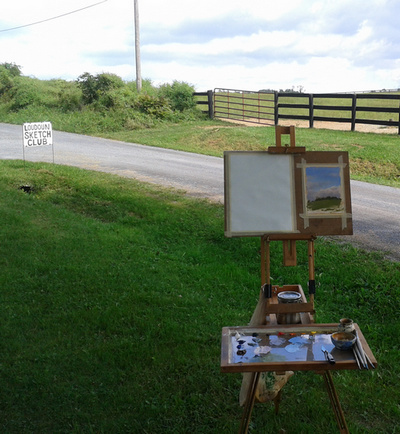 A plein air painting set up using a half-box Jullian easel.