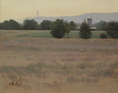 A completed landscape painting featuring a grain elevator, silo and the blue ridge mountains. The sky is yellow and there is a plowed field in the foreground.