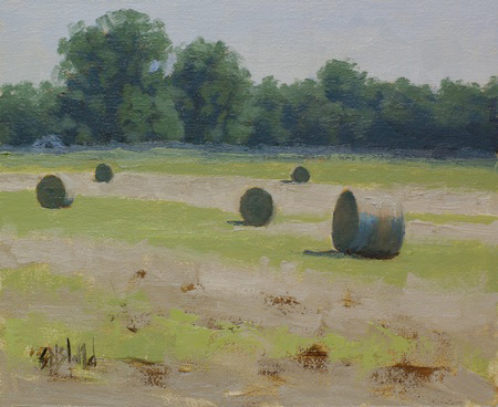 This painting of hay bales in a field has a strong feeling of light, bright pale greens and a distant treeline.