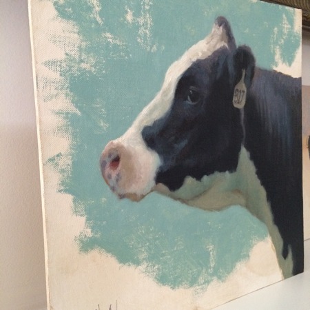 A portrait of a holstein cow