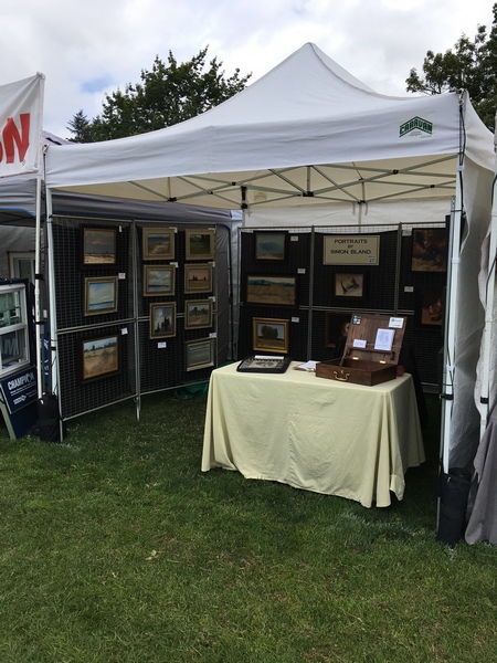 Artist's booth at Magnolia Summerfest