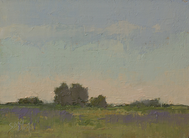 A small landscape oil painting with a soft color palette by artist Simon Bland