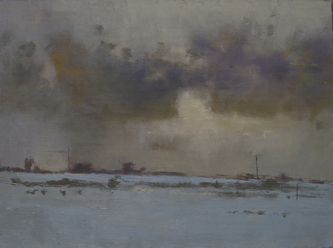 An oil painting of winter skies over snowy fields. The clouds are backlit by yellow light which contrasts with the blue gray of the snow. Two telegraph poles are visible as well as a scattering of dark bushes and broken fence posts in the field.