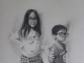 Graphite drawing of two children